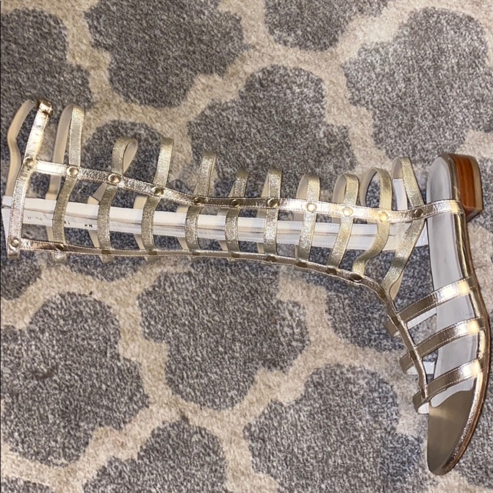 Stewart Weizmann gladiator gold sandals